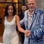 Brad Pitt Wears Blue Velvet Willy Chavarria Blazer as Ines de Ramon Stuns in Ivory Silk Boucle Fringed Gabriela Hearst Set