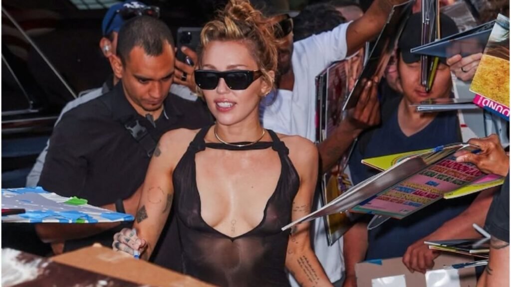 Miley Cyrus Wore a Black Ludovic de Saint Sernin ‘Carrie’ Dress to Celebrate ‘Something Beautiful’